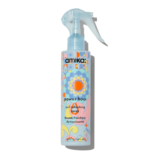 Amika Power Hour Curl Refreshing Spray 6.7 Oz for frizz-free, bouncy curls.