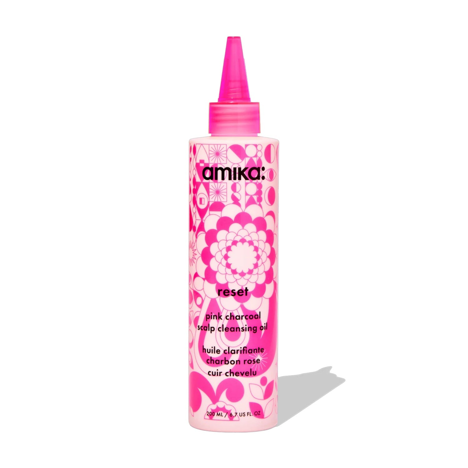 Amika Reset Pink Charcoal Scalp Oil 6.7 oz cleansing treatment.