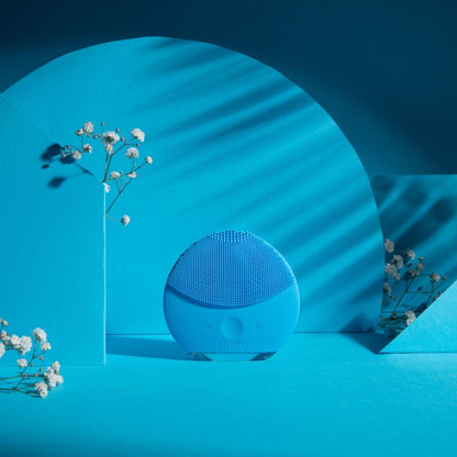 FOREO LUNA Mini 2 Aquamarine facial cleansing brush, compact silicone device for gentle deep skin cleansing.