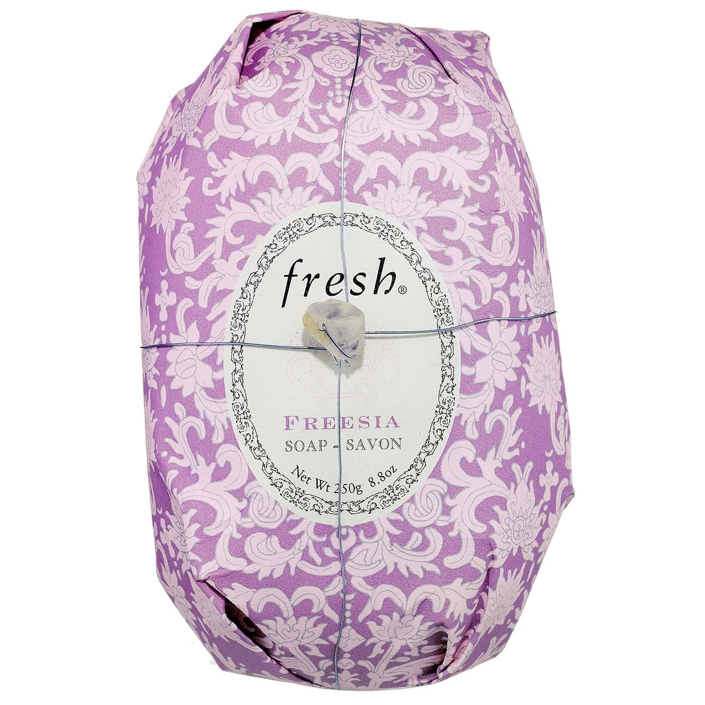 Fresh Oval Soap in Freesia scent with signature hand-wrapped packaging