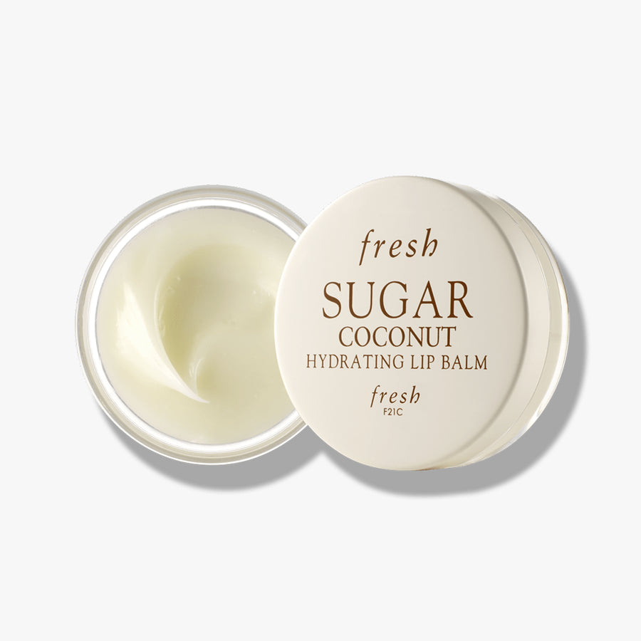 Fresh Sugar Hydrating Lip Balm in Coconut flavor in a sleek round jar for soft, moisturized lips