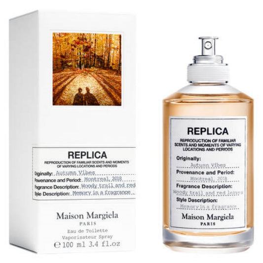Maison Margiela REPLICA Autumn Vibes Eau de Toilette 3.4 Oz bottle placed against a warm, seasonal background.







