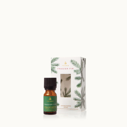 Thymes Frasier Fir Diffuser Oil 0.25 FL OZ – mini pine-scented fragrance oil for a cozy holiday atmosphere.








