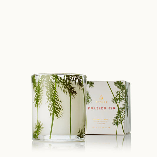 Thymes Frasier Fir Pine Needle Candle 6.5 OZ in glass jar with fresh pine needle scent for cozy and festive home ambiance.